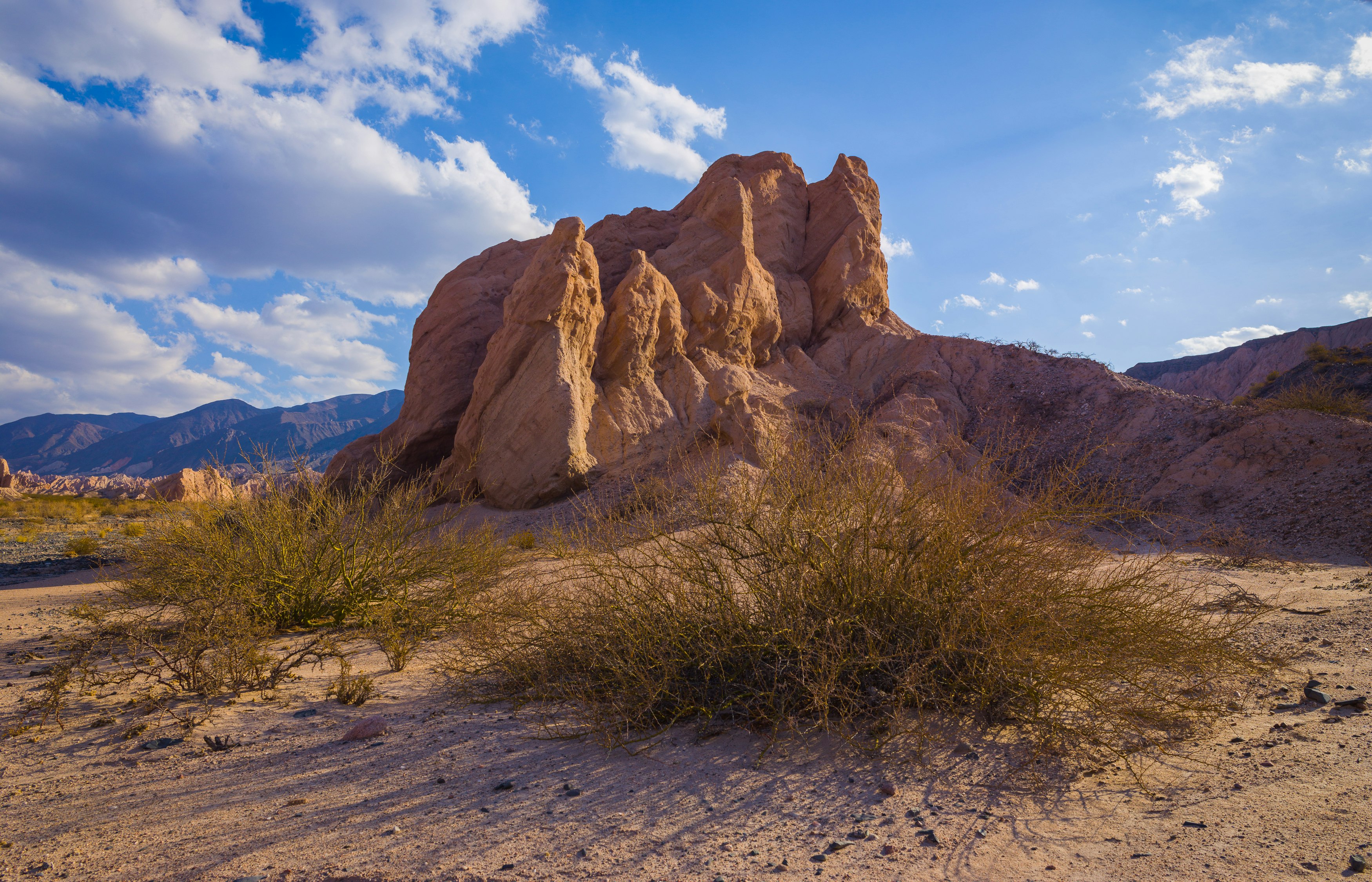 brown rock formation under blue sky during daytime